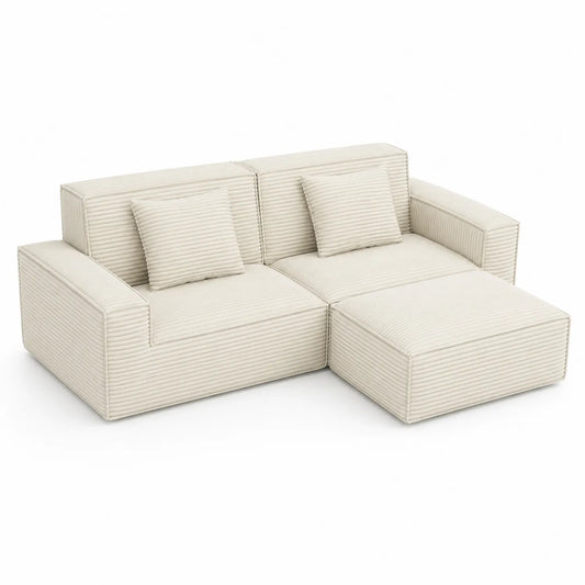 Sofá modular de pana beige con chaise longue y cojines